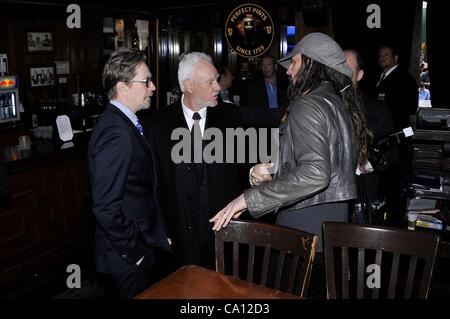 Gary Oldman, Malcolm McDowell, Rob Zombie at the induction ceremony for Star on the Hollywood Walk of Fame for Malcolm McDowell, Hollywood Boulevard, Los Angeles, CA March 16, 2012. Photo By: Michael Germana/Everett Collection Stock Photo