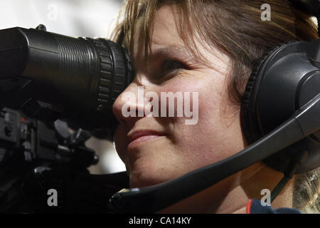 Nov. 25, 2011 - Charlottesville, Virginia, United States - A female camera person films during the game on November 26, 2011 at the John Paul Jones Arena in Charlottesville, Virginia. Virginia defeated Green Bay 68-42. (Credit Image: © Andrew Shurtleff/ZUMAPRESS.com) Stock Photo