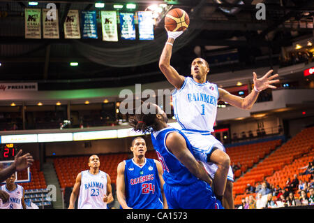 HALIFAX, NS - March 16, 2012: Halifax Rainmen forward #1 Darnell Hugee drives to the basket en route to a 106-95 victory over the Quebec Kebs in the decisive third game of their best-of-three National Basketball League of Canada semi-final playoff series at the Halifax Metro Centre. With the victory Stock Photo