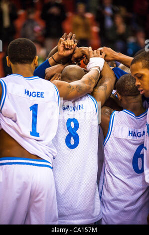 HALIFAX, NS - March 16, 2012: The Halifax Rainmen celebrate after defeating the Quebec Kebs 106-95 in the decisive third game of their best-of-three National Basketball League of Canada semi-final playoff series at the Halifax Metro Centre. With the victory, the Rainmen advance to their first-ever l Stock Photo