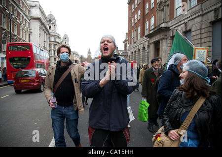 London, UK. 17/03/2012. UKUncut Protester call on the government to scrap its reforms of the NHS. ThUK uncutters of all ages take part in protest and civil disobedience, andcall on the government to scrap its reforms of the NHS, which they say are creating a market for healthcare and privatising the Stock Photo