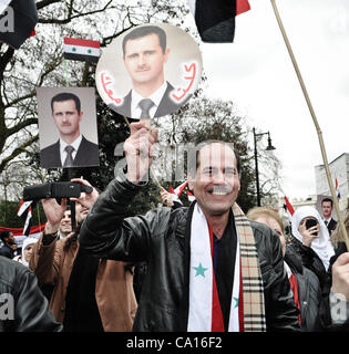 17/03/2012, London, UK: Paul Conroy, a Sunday Times photographer who was injured in Syria, makes an appearance at an Anti-Assad rally outside the Syrian Embassy in London and addresses the crowd. He spent most of the day in a wheelchair. Stock Photo