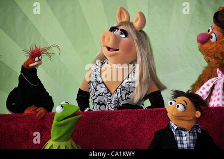 Pepe, Miss Piggy, Kermit, Walter, Fozzie at the induction ceremony for Star on the Hollywood Walk of Fame forThe Muppets, Hollywood Boulevard, Los Angeles, CA March 20, 2012. Photo By: Michael Germana/Everett Collection Stock Photo