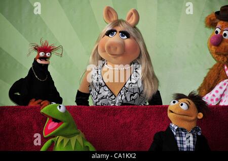 Pepe, Miss Piggy, Kermit, Walter, Fozzie at the induction ceremony for Star on the Hollywood Walk of Fame forThe Muppets, Hollywood Boulevard, Los Angeles, CA March 20, 2012. Photo By: Michael Germana/Everett Collection Stock Photo