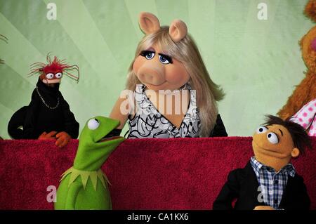 Pepe, Miss Piggy, Kermit, Walter at the induction ceremony for Star on the Hollywood Walk of Fame forThe Muppets, Hollywood Boulevard, Los Angeles, CA March 20, 2012. Photo By: Michael Germana/Everett Collection Stock Photo