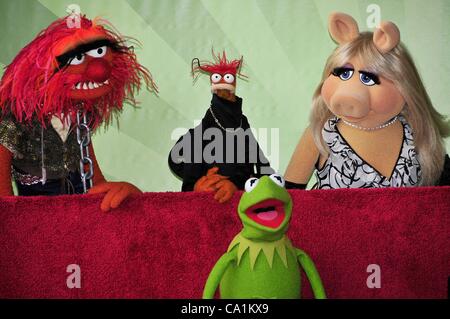 Animal, Pepe, Kermit, Miss Piggy at the induction ceremony for Star on the Hollywood Walk of Fame forThe Muppets, Hollywood Boulevard, Los Angeles, CA March 20, 2012. Photo By: Michael Germana/Everett Collection Stock Photo