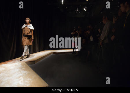 March 21, 2012, Tokyo, Japan - Photographers take photos of a model walking down the catwalk wearing 'fur fur' during Mercedes-Benz Fashion Week Tokyo 2012-13 Autumn/Winter. The Mercedes-Benz Fashion Week Tokyo runs from March 18-24. (Photo by Christopher Jue/AFLO) Stock Photo