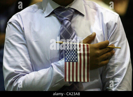 March 22, 2012 - Los Angeles, California, U.S. - People take the oath of citizenship as more than 8,000 people are sworn in as US citizens during naturalization ceremonies at the Los Angeles Convention Center. (Credit Image: © Ringo Chiu/ZUMAPRESS.com) Stock Photo