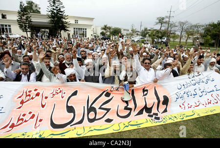 Members of WAPDA Hydro Electric Central Labor Union are protesting in favor of their demands during demonstration at WAPDA House in Peshawar on Tuesday, March 27, 2012. Stock Photo