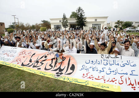 Members of WAPDA Hydro Electric Central Labor Union are protesting in favor of their demands during demonstration at WAPDA House in Peshawar on Tuesday, March 27, 2012.. Stock Photo