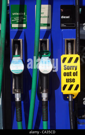 Petrol pump with sorry out of use sign attached to the handle Stock ...