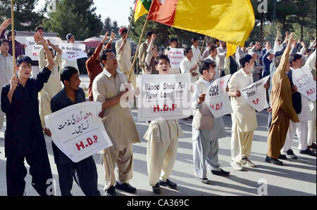 Supporters of Hazara Democratic Party (HDP) are protesting against target-killing of Hazara community during rally at Balochistan Assembly building in Quetta on Friday, March 30, 2012. Stock Photo