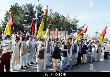 Supporters of Hazara Democratic Party (HDP) are protesting against target-killing of Hazara community during rally at Balochistan Assembly building in Quetta on Friday, March 30, 2012. Stock Photo