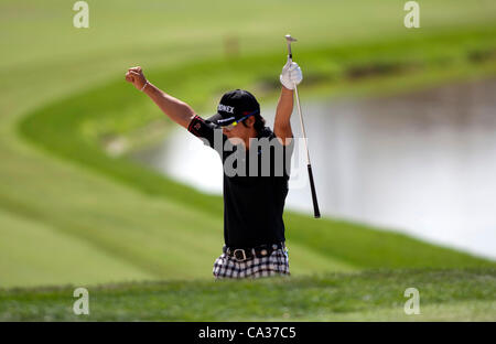 Ryo Ishikawa (JPN), MARCH 23, 2012 - Golf : Ryo Ishikawa of Japan celebrates after shoot a par shot from the sand trap on the 11th hole during the second round of the Arnold Palmer Invitational at Arnold Palmer's Bay Hill Club and Lodge in Orlando, Florida. (Photo by Thomas Anderson/AFLO)(JAPANESE N Stock Photo