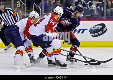 March 30, 2012 - Columbus, Ohio, U.S - Columbus Blue Jackets center Derick Brassard (16) tries to get control of the puck in front of Florida Panthers defenseman Erik Gudbranson (44) in the first period of the game between the Florida Panthers and Columbus Blue Jackets at Nationwide Arena, Columbus, Stock Photo