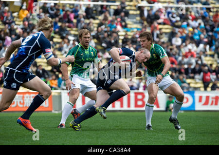 Action from Scotland's game against South Africa in round 7 of the rugby 7s world series in Tokyo, Japan on 31 March, 2012. South Africa won 14-0. Photographer: Robert Gilhooly Stock Photo
