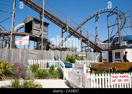 Hayling Island roller coaster and mini railway station Stock Photo