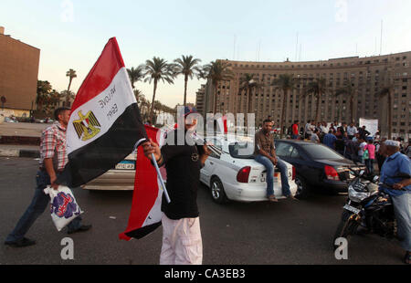 May 31, 2012 - Cairo, Cairo, Egypt - Egyptian Protester waves flag during a protest against candidate Ahmed Shafiq, at Tahrir Square in Cairo May 31, 2012. The prospect of Shafiq succeeding Hosni Mubarak as president of Egypt is a nightmare for revolutionaries and Islamists, but a security blanket f Stock Photo