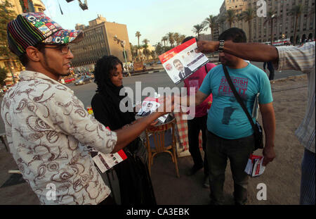 May 31, 2012 - Cairo, Cairo, Egypt - Egyptian Protester holds picture of candidate Mohammed Morsi during a protest against candidate Ahmed Shafiq, at Tahrir Square in Cairo May 31, 2012. The prospect of Shafiq succeeding Hosni Mubarak as president of Egypt is a nightmare for revolutionaries and Isla Stock Photo