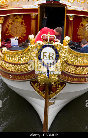 The Queen's / Queen Elizabeth's / Elizabeth Rex Royal Crest / cypher and stern of Queen's Royal Barge 'Gloriana'. UK. Stock Photo