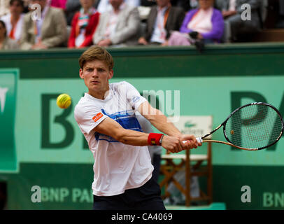 03.06.2012 Paris, France. David Goffin in action against Roger Federer on day 8 of the French Open Tennis from Roland Garros.
