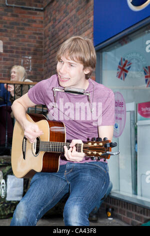 Sunday 03 June 2012: Buskival Festival York City Centre busker's performing as part of Home Sense sponsored event.  Annual event with street artists, performers, buskers, musicians. Stock Photo