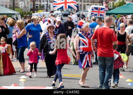 Bristol, UK. 04 June, 2012. The local residents of Sandgate Road, Brislington, Bristol had their street closed off for Monday 4th June 2012, to celebrate the Queen's Diamond Jubilee with a host of activities including fancy dress, keep fit and a tug of war. Stock Photo