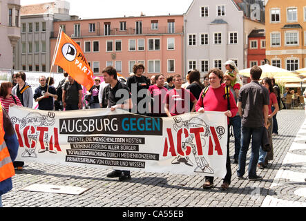 June 09.2012 augsburg,pacific avenue,germany, piratenparty demonstration against ACTA Internet Law, control of communication and censorship of internet, holding banners and signs