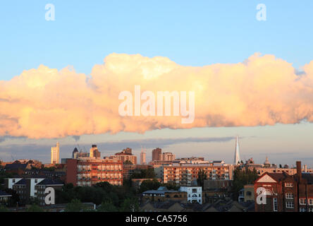 Saturday June 9th - the end of a rare day of summer sunshine in a week of heavy rain and low pressure in London, England, UK Taken from Kings Cross, looking south towards the City. Stock Photo