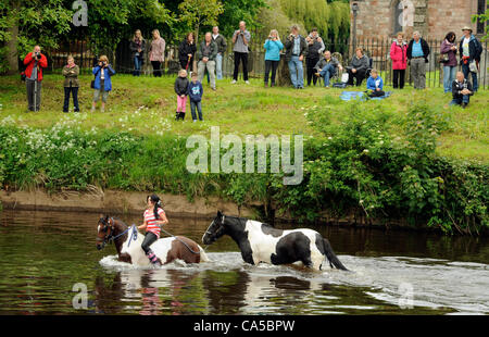 Appleby Horse Fair 2012. Thousands of people from the Gypsy and Traveller community descend on the small Cumbrian town of Appleby in Westmorland for the annual Appleby New Fair. The ancient fair dates back centuries and is one of the main events of the year for the Gypsy and Traveller community. The Stock Photo