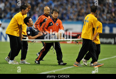 Maya Yoshida, June 8, 2012, Saitama, Japan : Maya Yoshida lies on a stretcher in the first half during the match between Japan and Jordan of FIFA World Cup Brazil Asian Qualifier at Saitama Stadium in Saitama prefecture, Japan, on June 8, 2012.  (Photo by AFLO) Stock Photo