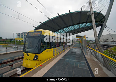 13 June 2012.  A Metrolink tram at the Central Park Transport Interchange at Newton Heath, Manchester.  Taken on the first day of the new Metrolink tram service between Manchester and Oldham. Stock Photo