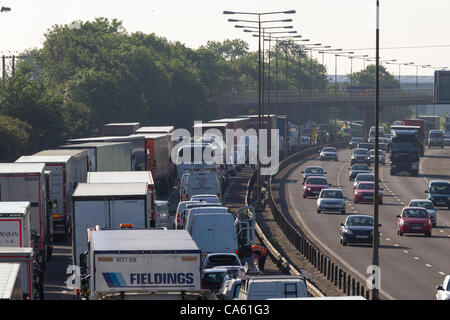 14 June 2012 M1 motorway Southbound Northamptonshire England UK. Lorry Crashed just before Junction 15A Driver critical. Air Ambulance at     scene. Stock Photo