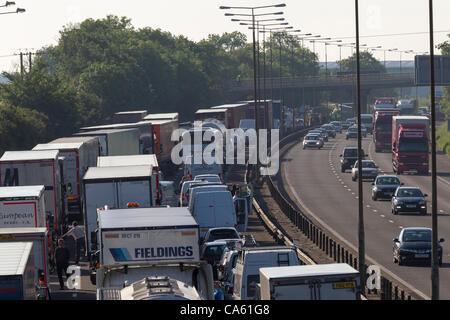14 June 2012 M1 motorway Southbound Northamptonshire England UK. Lorry Crashed just before Junction 15A Driver critical. Air Ambulance at   scene. Stock Photo