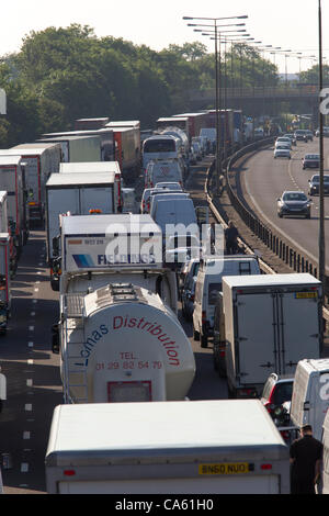 14 June 2012 M1 motorway Southbound Northamptonshire England UK. Lorry Crashed just before Junction 15A Driver critical. Air Ambulance at scene. Stock Photo