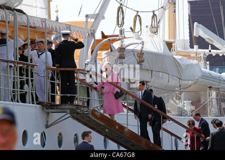 June Friday 15, 2012 - Queen Margrethe II of Denmark and the Chinese President Hu Jintao and his wife boarding the royal Danish yacht HDMY Dannebrog at Amaliehaven near the Amalienborg Palace in the port of Copenhagen for a short guided cruise in the harbour on the official visit to Denmark. Stock Photo