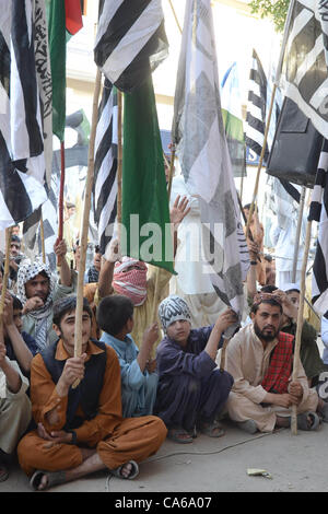 Activists of Difa-e-Pakistan Council protested in front of Quetta Press Club on Friday. Maulana Ramazan Mengal addressed the protestors in Quetta June 15, 2012 Stock Photo