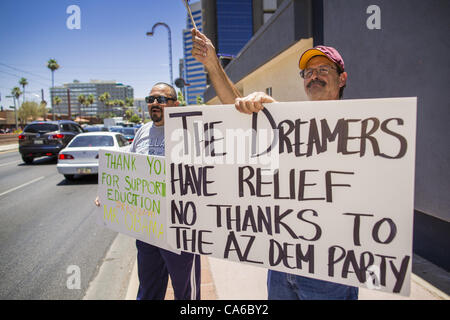 June 15, 2012 - NICK THOMAS and others in Phoenix thank President Obama for his immigration announcement Friday. President Barrack Obama announced Friday that fffective immediately, young people who were brought to the US through no fault of their own as children and who meet certain criteria will b Stock Photo