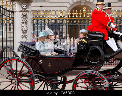 London, UK. 16 June, 2012. Camilla Parker Bowles Duchess of Cornwall and Kate Middleton Duchess of  Cambridge with Prince Harry , leave Buckingham Palace in royal coach for Ceremony of Trooping the Colour June 2012 Stock Photo