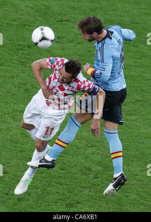 18.06.2012. Gdansk, Poland.  Croatia's Darijo Srna (L) and Spain's Sergio Ramos vie for the ball during UEFA EURO 2012 group C soccer match Spain vs Italy at Arena Gdansk in Gdansk, Poland, 18 June 2012. Stock Photo