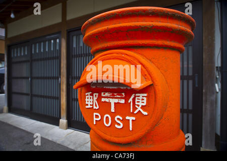 June 15, 2012 - Yamanaka Onsen, Japan - June 15, 2012 - Yamanaka Onsen, Japan - Yamanaka Onsen is a small city in Kaga Prefecture, in western Japan, famous for its onsen, or natural hot spring baths. An old-fashioned mail box. (Credit Image: © David Poller/ZUMAPRESS.com) Stock Photo