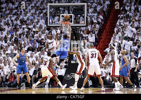 19.06.2012. Miami, Florida, USA.  Oklahoma City Thunder point guard Russell Westbrook (0) goes for the layup over Miami Heat power forward Chris Bosh (1) during the third quarter of Game 4 of the 2012 NBA Finals, Thunder at Heat, at the American Airlines Arena, Miami, Florida, USA. Stock Photo
