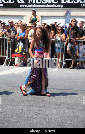 Participants march in the 30th annual 2012 Coney Island Mermaid Parade on Saturday, June 23, 2012 in Brooklyn, New York City, USA. The Mermaid Parade is the USA's largest art parade and celebrates the start of summer. Participants dress in mermaid, Neptune and sea creature costumes. Stock Photo