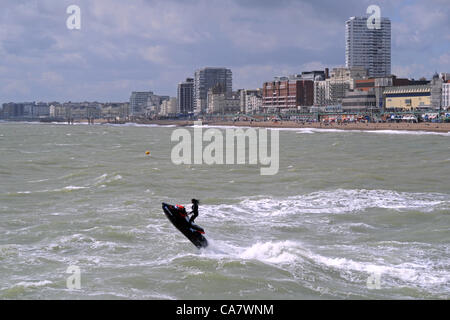 Brighton UK 24 June 2012 - Jet Skiers enjoying the choppy seas and breeze off Brighton seafront today Stock Photo