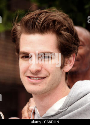 June 26, 2012 - Brooklyn, New York, U.S. - Actor ANDREW GARFIELD, from the cast of 'The Amazing Spiderman' helps Beautify Brooklyn Community, as Part of the Be Amazing, Stand Up and Volunteer Initiative held at Farragut Houses. (Credit Image: © Nancy Kaszerman/ZUMAPRESS.com) Stock Photo