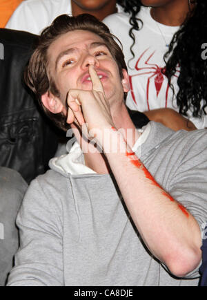 June 26, 2012 - Brooklyn, New York, U.S. - Actor ANDREW GARFIELD, from the cast of 'The Amazing Spiderman' help Beautify Brooklyn Community, as Part of the Be Amazing, Stand Up and Volunteer Initiative held at Farragut Houses. (Credit Image: © Nancy Kaszerman/ZUMAPRESS.com) Stock Photo