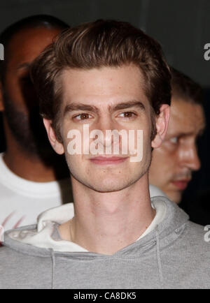 June 26, 2012 - Brooklyn, New York, U.S. - Actor ANDREW GARFIELD, from the cast of 'The Amazing Spiderman' help Beautify Brooklyn Community, as Part of the Be Amazing, Stand Up and Volunteer Initiative held at Farragut Houses. (Credit Image: © Nancy Kaszerman/ZUMAPRESS.com) Stock Photo