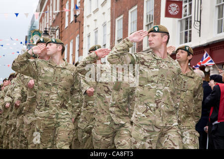 Worcester, England, UK. Wednesday 27th June 2012.  Soldiers from 2nd Battalion Mercian Regiment, Grenadier Guards, Queen's Royal Hussars and members of the Royal British legion, parade through the streets of Worcester. Seven soldiers from the city were also given their service medals. Stock Photo