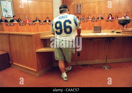 (Published 01/29/1997, A-1) Dave Kirkpatrick of Escondido donned his Chargers jersey and cap as he addressed the San Diego City Council in support of the stadium plan. After listening to an hour of public testimony, the council voted unanimously to hold a special election. Photo by Roni Galgano/ Stock Photo