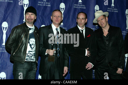 Feb 23, 2003; New York, NY, USA; Presenter U2's 'The Edge' & recording artists 'The Clash' TERRY CHIMES, MICK JONES & PAUL SIMONON @ the 18th Annual Rock And Roll Hall Of Fame Induction Dinner held @ the Waldorf Astoria Hotel. Stock Photo